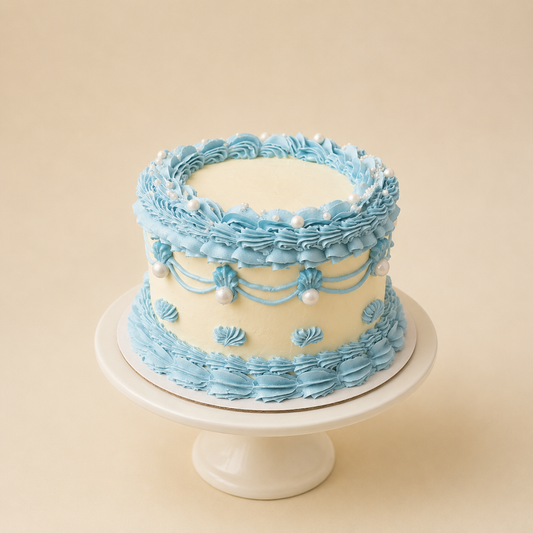 Vintage Shell‑Trimmed Cake